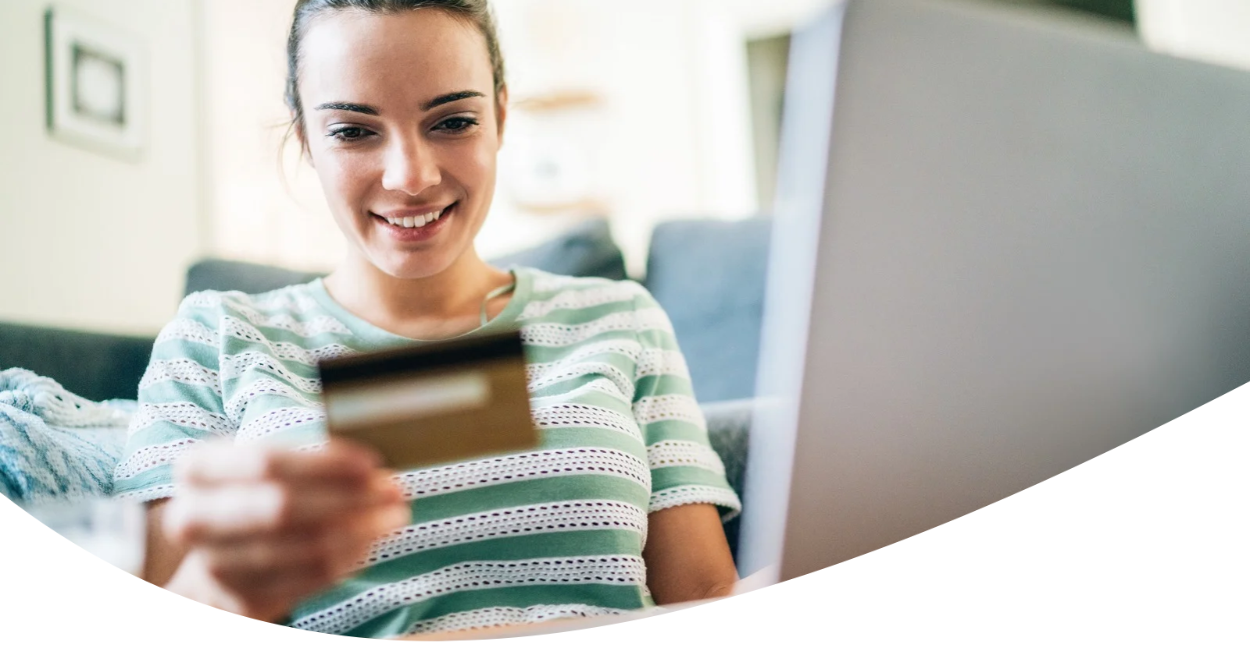 person holding payment card
