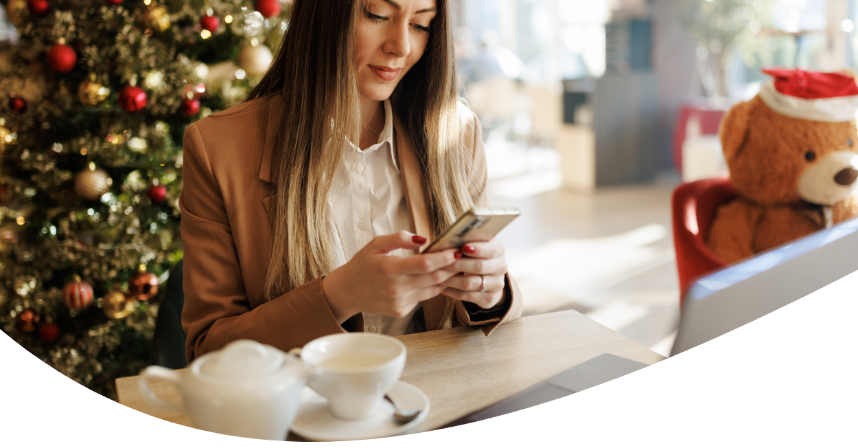 woman looking at mobile device