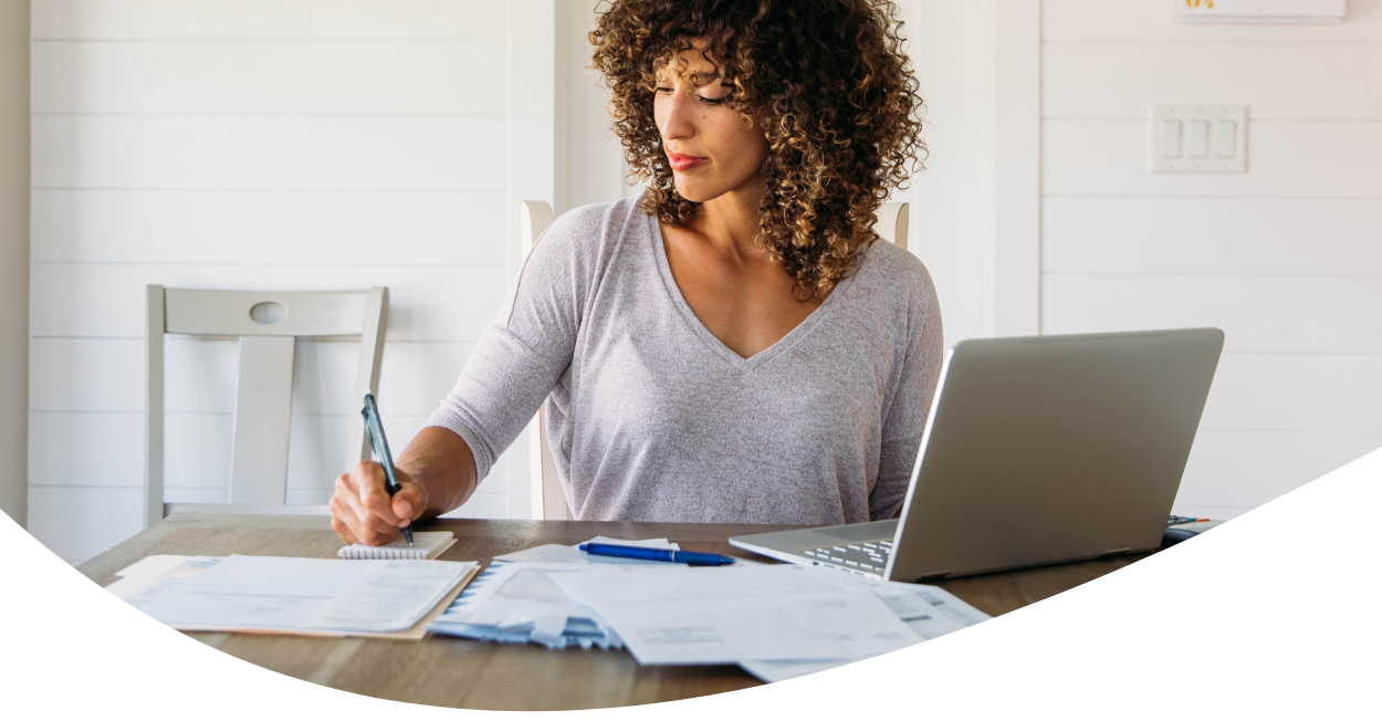 woman looking at finances