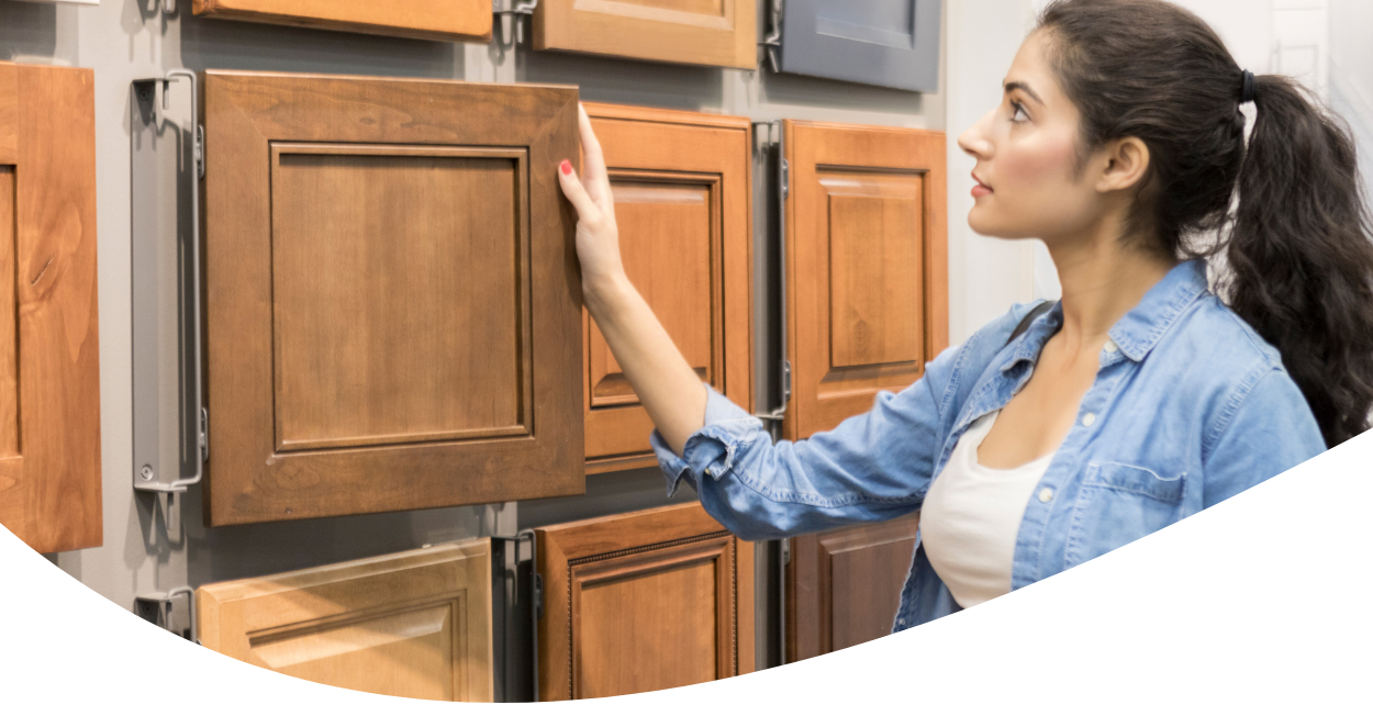 woman looking at cabinets