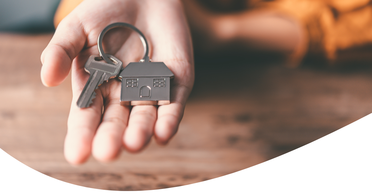 person holding keys img