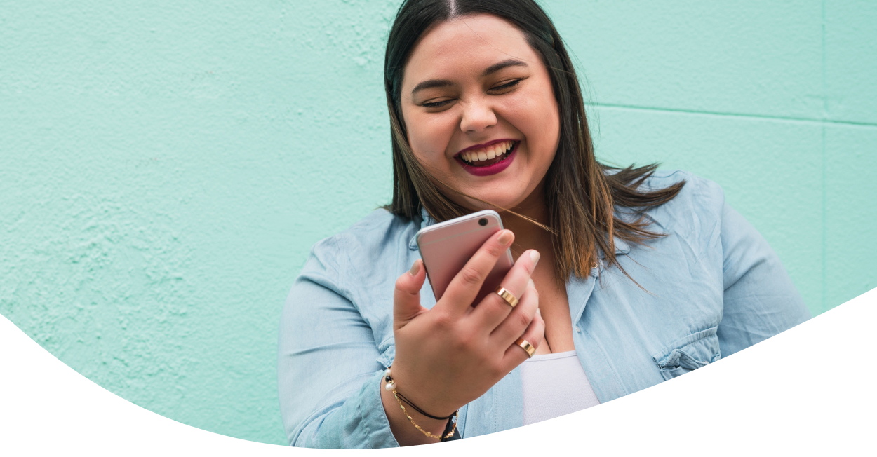 woman looking at smartphone