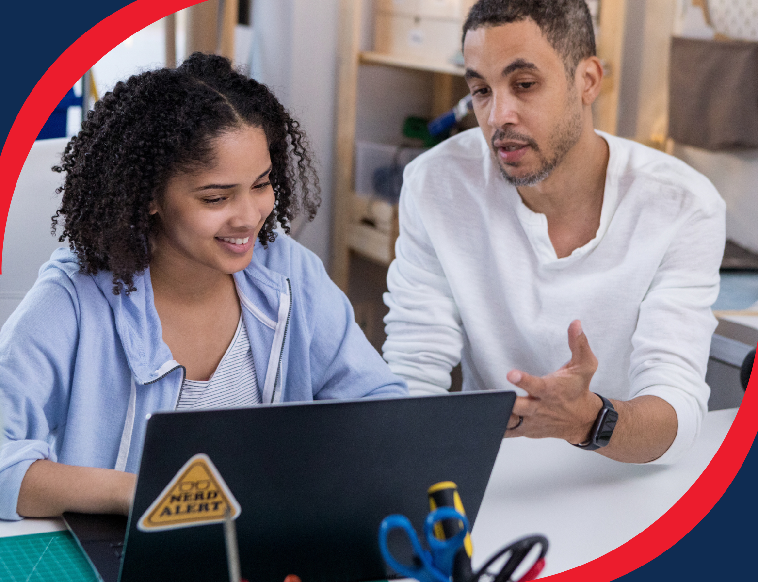 parent and child working at computer